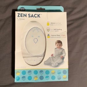 New in box- infant calming/sleep sack by nested bean.